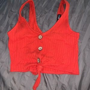 Bright red cropped tank top with tie in front